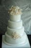 Tiered Wedding Cake vs. Mini Cakes Tower